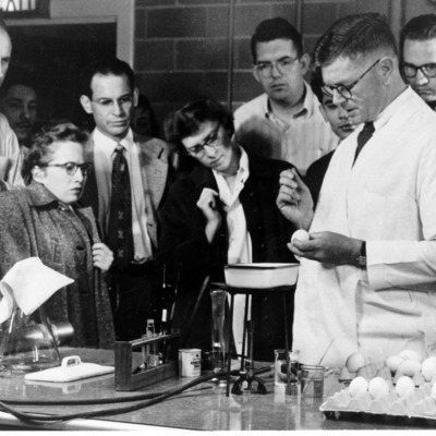 Sir Frank Macfarlane Burnet demonstrating his technique for growing influenza viruses in chicken eggs at the University of Wisconsin, 1952